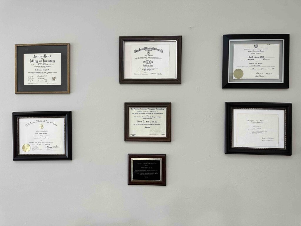 Dr. Song’s framed diplomas and board certifications