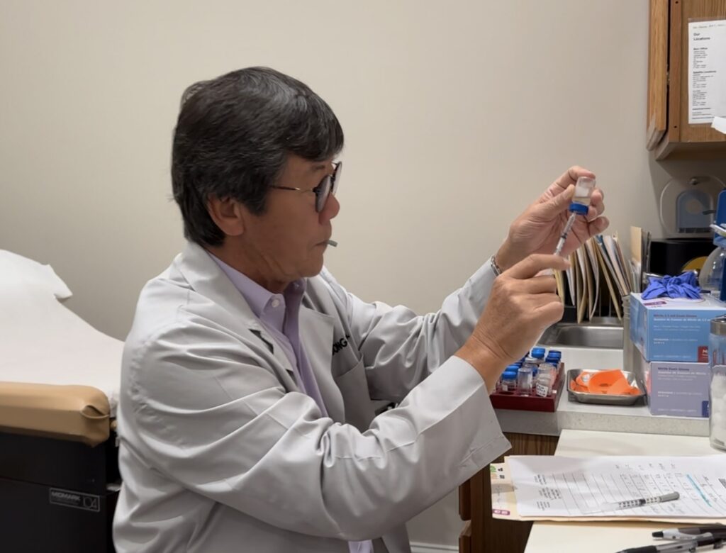 Dr. Song preparing an immunotherapy treatment